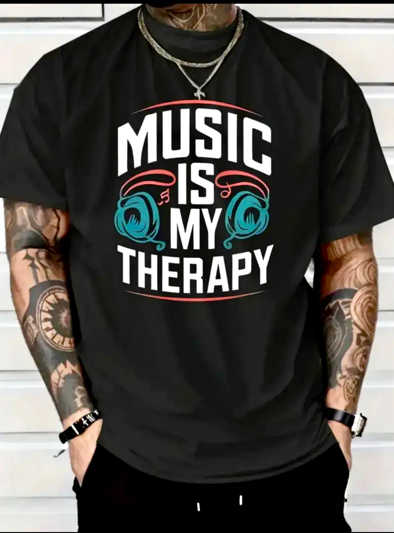 Men’s relaxed fit black graphic T-shirt. “Music is my Therapy and headphone” design.